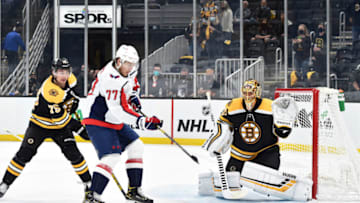May 21, 2021; Boston, Massachusetts, USA; Washington Capitals right wing T.J. Oshie (77) looks to deflect the puck on Boston Bruins goaltender Tuukka Rask (40) while defenseman Connor Clifton (75) defends during the third period in game four of the first round of the 2021 Stanley Cup Playoffs at TD Garden. Mandatory Credit: Bob DeChiara-USA TODAY Sports