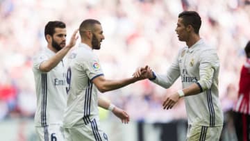 BILBAO, SPAIN - MARCH 18: Karim Benzema of Real Madrid celebrates with his team mate Cristiano Ronaldo of Real Madrid after scoring the opening goal during the La Liga match between Athletic Club Bilbao and Real Madrid at San Mames Stadium on March 18, 2017 in Bilbao, Spain. (Photo by Juan Manuel Serrano Arce/Getty Images)
