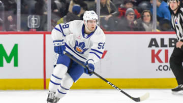 LAVAL, QC, CANADA - MARCH 6: Michael Carcone #58 of the Toronto Marlies in control of the puck against the Laval Rocket at Place Bell on March 6, 2019 in Laval, Quebec. (Photo by Stephane Dube /Getty Images)