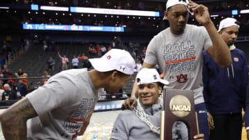 KANSAS CITY, MISSOURI - MARCH 31: J'Von McCormick #12, Chuma Okeke #5 and Austin Wiley #50 of the Auburn Tigers celebrate after their 77-71 win over the Kentucky Wildcats in the 2019 NCAA Basketball Tournament Midwest Regional at Sprint Center on March 31, 2019 in Kansas City, Missouri. (Photo by Christian Petersen/Getty Images)