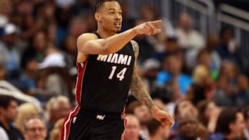 Apr 8, 2016; Orlando, FL, USA; Miami Heat forward Gerald Green (14) points after he made a basket against the Orlando Magic during the second half at Amway Center. Orlando Magic defeated the Miami Heat 112-109. Mandatory Credit: Kim Klement-USA TODAY Sports