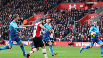 SOUTHAMPTON, ENGLAND - DECEMBER 10: Charlie Austin of Southampton scores the first Southampton goal during the Premier League match between Southampton and Arsenal at St Mary's Stadium on December 9, 2017 in Southampton, England. (Photo by Catherine Ivill/Getty Images)