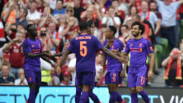 DUBLIN, IRELAND - AUGUST 04: Mohamed Salah of Liverpool celebrates with team mates after scoring during the international friendly game between Liverpool and Napoli at Aviva Stadium on August 4, 2018 in Dublin, Ireland. (Photo by Charles McQuillan/Getty Images)