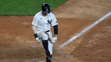 NEW YORK, NEW YORK - SEPTEMBER 25: Clint Frazier #77 of the New York Yankees breaks his bat over his leg after striking out during the eighth inning against the Miami Marlins at Yankee Stadium on September 25, 2020 in the Bronx borough of New York City. (Photo by Sarah Stier/Getty Images)