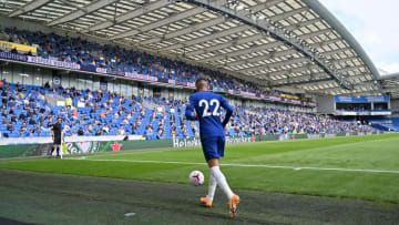 Socially distanced fans watch from the stands as Chelsea's Moroccan midfielder Hakim Ziyech goes to take a corner during the pre-season friendly football match between Brighton and Hove Albion and Chelsea at the American Express Community Stadium in Brighton, southern England on August 29, 2020. - The game is a 'pilot' event where a small number of fans will be present on a socially-distanced basis. The aim is to get fans back into stadiums in the Premier League by October. (Photo by Glyn KIRK / AFP) (Photo by GLYN KIRK/AFP via Getty Images)