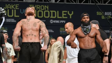 CLEVELAND, OHIO - AUGUST 28: Jake Paul and Tyron Woodley look on during the weigh in event at the State Theater prior to their August 29 fight on August 28, 2021 in Cleveland, Ohio. (Photo by Jason Miller/Getty Images)