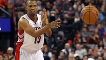 Mar 10, 2013; Toronto, Ontario, CAN; Toronto Raptors guard Sebastian Telfair (13) passes the ball against the Cleveland Cavaliers during the second half at the Air Canada Centre. Toronto defeated Cleveland 100-96. Mandatory Credit: John E. Sokolowski-USA TODAY Sports