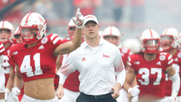 Sep 4, 2021; Lincoln, Nebraska, USA; Nebraska Cornhuskers head coach Scott Frost leads his team onto the field against the Fordham Rams in the first half at Memorial Stadium. Mandatory Credit: Bruce Thorson-USA TODAY Sports