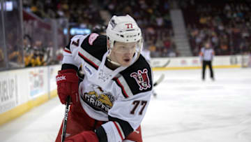 CLEVELAND, OH - APRIL 09: Grand Rapids Griffins RW Evgeny Svechnikov (77) plays the puck during the first period of the AHL hockey game between the Grand Rapids Griffins and Cleveland Monsters on April 9, 2017, at Quicken Loans Arena in Cleveland, OH. Cleveland defeated Grand Rapids 4-3 in a shootout. (Photo by Frank Jansky/Icon Sportswire via Getty Images)