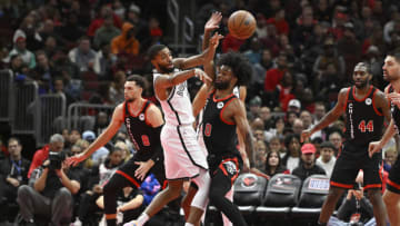 Nov 3, 2023; Chicago, Illinois, USA; Brooklyn Nets forward Mikal Bridges (1) passes the ball away from Chicago Bulls guard Coby White (0) during the second half at the United Center. Mandatory Credit: Matt Marton-USA TODAY Sports