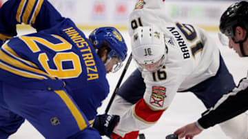Apr 3, 2022; Buffalo, New York, USA; The linesman dropped the puck for a face-off between Buffalo Sabres center Vinnie Hinostroza (29) and Florida Panthers center Aleksander Barkov (16) during the first period at KeyBank Center. Mandatory Credit: Timothy T. Ludwig-USA TODAY Sports