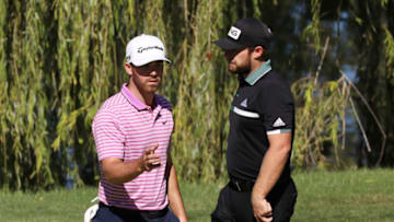 LAS VEGAS, NEVADA - OCTOBER 16: Matthew Wolff of the United States reacts on the fourth green as Tyrrell Hatton of England looks on during the second round of the CJ Cup @ Shadow Creek on October 16, 2020 in Las Vegas, Nevada. (Photo by Christian Petersen/Getty Images)