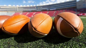 Oct 12, 2013; Madison, WI, USA; Footballs sit on the field prior to the game between the Northwestern Wildcats and Wisconsin Badgers at Camp Randall Stadium. Wisconsin won 35-6. Mandatory Credit: Jeff Hanisch-USA TODAY Sports