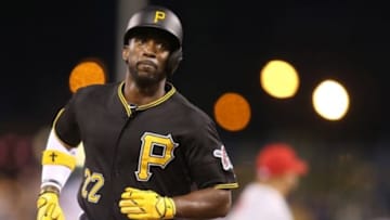 May 8, 2015; Pittsburgh, PA, USA; Pittsburgh Pirates center fielder Andrew McCutchen (22) runs from second to third base against the St. Louis Cardinals during the sixth inning at PNC Park. Mandatory Credit: Charles LeClaire-USA TODAY Sports