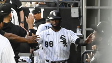 Aug 22, 2023; Chicago, Illinois, USA; Chicago White Sox center fielder Luis Robert Jr. (88) celebrates in the dugout after he scores against the Seattle Mariners during the first inning at Guaranteed Rate Field. Mandatory Credit: Matt Marton-USA TODAY Sports