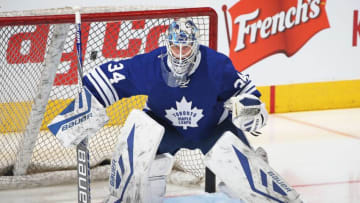 TORONTO, ON - FEBRUARY 18: James Reimer #34 of the Toronto Maple Leafs faces a shot in the warm-up prior to play against the New York Rangers in an NHL game at the Air Canada Centre on February 18, 2016 in Toronto, Ontario, Canada. The Rangers defeated the Maple Leafs 4-2. (Photo by Claus Andersen/Getty Images)