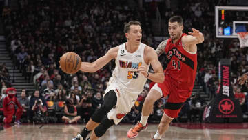 Miami Heat guard Duncan Robinson (55) dribbles past Toronto Raptors forward Juancho Hernangomez (41)( John E. Sokolowski-USA TODAY Sports)