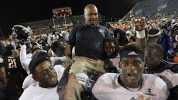 Dec 23, 2015; Mobile, AL, USA; Georgia Southern Eagles head coach Dell McGee is carried on to the field on the shoulders of his players after defeating the Bowling Green Falcons of the 2015 GoDaddy Bowl at Ladd-Peebles Stadium. Georgia Southern won 58-27. Mandatory Credit: Glenn Andrews-USA TODAY Sports