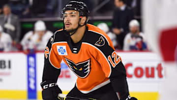 LAVAL, QC - NOVEMBER 30: Lehigh Valley Phantoms left wing Tyrell Goulbourne (12) waits for a faceoff during the Lehigh Valley Phantoms versus the Laval Rocket game on November 30, 2018, at Place Bell in Laval, QC (Photo by David Kirouac/Icon Sportswire via Getty Images)