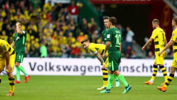 BREMEN, GERMANY - APRIL 29: Marco Reus (C) of Dortmund looks dejected after the Bundesliga match between SV Werder Bremen and Borussia Dortmund at Weserstadion on April 29, 2018 in Bremen, Germany. (Photo by Martin Rose/Bongarts/Getty Images)