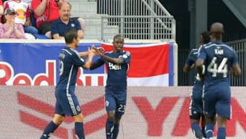 Jun 20, 2015; Harrison, NJ, USA; Vancouver Whitecaps FC midfielder Kekuta Manneh (23) celebrates his goal against the New York Red Bulls with Vancouver Whitecaps FC forward Octavio Rivero (29) during the first half at Red Bull Arena. Mandatory Credit: Brad Penner-USA TODAY Sports