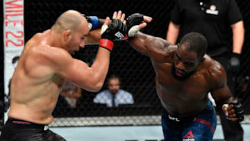 HAMBURG, GERMANY - JULY 22: (R-L) Corey Anderson punches Glover Teixeira of Brazil in their light heavyweight bout during the UFC Fight Night at Barclaycard Arena on July 22, 2018 in Hamburg, Germany. (Photo by Jeff Bottari/Zuffa LLC/Zuffa LLC via Getty Images)