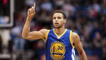 Nov 12, 2015; Minneapolis, MN, USA; Golden State Warriors guard Stephen Curry (30) celebrates a basket in the third quarter against the Minnesota Timberwolves at Target Center. The Golden State Warriors beat he Minnesota Timberwolves 129-116. Mandatory Credit: Brad Rempel-USA TODAY Sports
