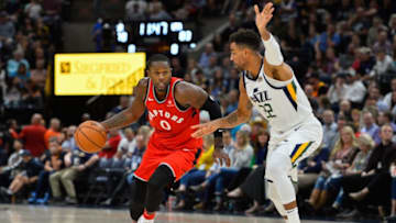 SALT LAKE CITY, UT - OCTOBER 02: CJ Miles (0) of the Toronto Raptors attempts to drive past Thabo Sefolosha (22) of the Utah Jazz during a game at Vivint Smart Home Arena on October 2, 2018 in Salt Lake City, Utah. Copyright 2018 NBAE (Photo by Alex Goodlett/Getty Images)