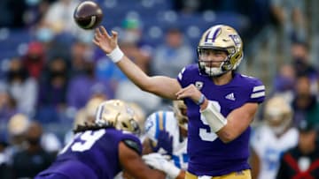 Oct 16, 2021; Seattle, Washington, USA; Washington Huskies quarterback Dylan Morris (9) passes against the UCLA Bruins during the first quarter at Alaska Airlines Field at Husky Stadium. Mandatory Credit: Joe Nicholson-USA TODAY Sports