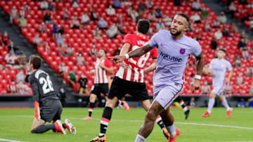 VIGO, SPAIN - AUGUST 21: Memphis Depay of FC Barcelona celebrates 1-1 during the La Liga Santander match between Athletic de Bilbao v FC Barcelona at the Estadio San Mames on August 21, 2021 in Vigo Spain (Photo by David S. Bustamante/Soccrates/Getty Images)