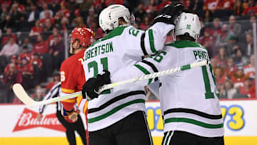 Apr 21, 2022; Calgary, Alberta, CAN; Dallas Stars forward Jason Robertson (21) celebrates his goal with forward Joe Pavelski (16) against the Calgary Flames during the second period at Scotiabank Saddledome. Mandatory Credit: Candice Ward-USA TODAY Sports