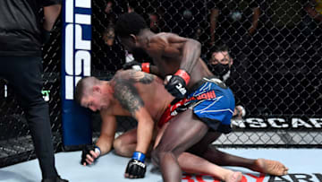 LAS VEGAS, NEVADA - FEBRUARY 05: (R-L) Chidi Njokuani punches Marc-Andre Barriault of Canada in their middleweight fight during the UFC Fight Night event at UFC APEX on February 05, 2022 in Las Vegas, Nevada. (Photo by Chris Unger/Zuffa LLC)
