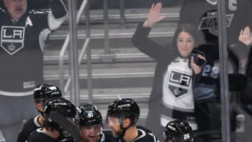Mar 20, 2023; Los Angeles, California, USA; Los Angeles Kings right wing Carl Grundstrom (91), defenseman Alexander Edler (2), defenseman Sean Walker (26), right wing Carl Grundstrom (91), center Zack MacEwen (17), and center Rasmus Kupari (89) celebrate after scoring a point during third period against Calgary Flames at Crypto.com Arena. Mandatory Credit: Jonathan Hui-USA TODAY Sports