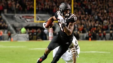 RALEIGH, NORTH CAROLINA - NOVEMBER 08: Jakobi Meyers #11 of the North Carolina State Wolfpack makes a catch against Ja'Sir Taylor #24 of the Wake Forest Demon Deacons during the first half of their game at Carter-Finley Stadium on November 08, 2018 in Raleigh, North Carolina. (Photo by Grant Halverson/Getty Images)