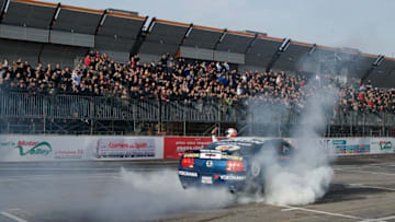 BOLOGNA, ITALY - DECEMBER 06: Mattia Pasini of Italy and Ford Mustang drives during the Yokohama Superbikers Drifting during the Motor Show 2009 on December 6, 2009 in Bologna, Italy. (Photo by Mirco Lazzari/Getty Images)