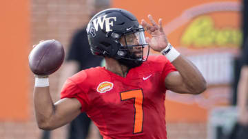 Jan 27, 2021; American quarterback Jamie Newman of Wake Forest/Georgia (7) drills during American practice at Hancock Whitney Stadium in Mobile, Alabama, USA; Mandatory Credit: Vasha Hunt-USA TODAY Sports
