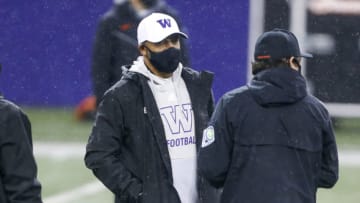 Nov 14, 2020; Seattle, Washington, USA; Washington Huskies head coach Jimmy Lake watches pregame warmups against the Oregon State Beavers at Alaska Airlines Field at Husky Stadium. Mandatory Credit: Joe Nicholson-USA TODAY Sports