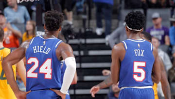 SACRAMENTO, CA - NOVEMBER 1: Buddy Hield #24 and De'Aaron Fox #5 of the Sacramento Kings look on during the game against the Utah Jazz on November 1, 2019 at Golden 1 Center in Sacramento, California. NOTE TO USER: User expressly acknowledges and agrees that, by downloading and or using this photograph, User is consenting to the terms and conditions of the Getty Images Agreement. Mandatory Copyright Notice: Copyright 2019 NBAE (Photo by Rocky Widner/NBAE via Getty Images)