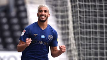 DERBY, ENGLAND - JULY 11: Saïd Benrahma of Brentford celebrates scoring the second goal during the Sky Bet Championship match between Derby County and Brentford at Pride Park Stadium on July 11, 2020 in Derby, England. Football Stadiums around Europe remain empty due to the Coronavirus Pandemic as Government social distancing laws prohibit fans inside venues resulting in all fixtures being played behind closed doors.​ (Photo by Ross Kinnaird/Getty Images)