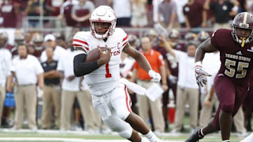 Sep 24, 2016; San Marcos, TX, USA; Houston Cougars quarterback Greg Ward Jr. (1) runs the ball for a touchdown against the Texas State Bobcats at Bobcat Stadium. Mandatory Credit: Soobum Im-USA TODAY Sports