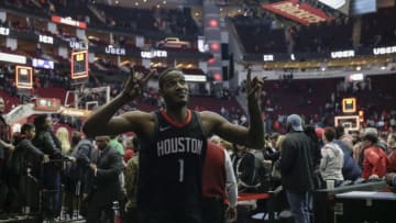 HOUSTON, TX - DECEMBER 31: Trevor Ariza #1 of the Houston Rockets celebrates on the way to the locker room after the game against the Los Angeles Lakers at Toyota Center on December 31, 2017 in Houston, Texas. NOTE TO USER: User expressly acknowledges and agrees that, by downloading and or using this photograph, User is consenting to the terms and conditions of the Getty Images License Agreement. (Photo by Tim Warner/Getty Images)
