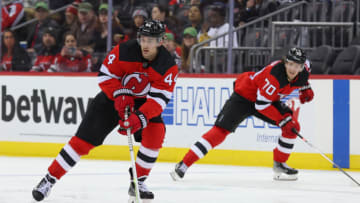 New Jersey Devils left wing Miles Wood (44) skates with the puck against the Montreal Canadiens during the second period at Prudential Center. Mandatory Credit: Ed Mulholland-USA TODAY Sports