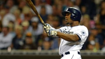 Aug 18, 2015; San Diego, CA, USA; San Diego Padres left fielder Justin Upton (10) doubles during the sixth inning against the Atlanta Braves at Petco Park. Mandatory Credit: Jake Roth-USA TODAY Sports