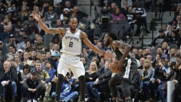 SAN ANTONIO, TX - DECEMBER 26: DeMarre Carroll #9 of the Brooklyn Nets handles the ball against Kawhi Leonard #2 of the San Antonio Spurs on December 26, 2017 at the AT&T Center in San Antonio, Texas. NOTE TO USER: User expressly acknowledges and agrees that, by downloading and or using this photograph, user is consenting to the terms and conditions of the Getty Images License Agreement. Mandatory Copyright Notice: Copyright 2017 NBAE (Photos by Mark Sobhani/NBAE via Getty Images)