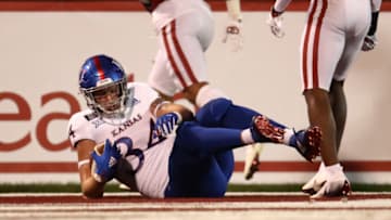 Nov 7, 2020; Norman, Oklahoma, USA; Kansas Jayhawks tight end Will Huggins (34) catches a touchdown pass during the second half against the Oklahoma Sooners at Gaylord Family-Oklahoma Memorial Stadium. Mandatory Credit: Kevin Jairaj-USA TODAY Sports