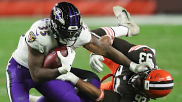 Ravens running back Gus Edwards. (Jeff Lange/Beacon Journal)