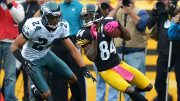 PITTSBURGH, PA - OCTOBER 07: Antonio Brown #84 of the Pittsburgh Steelers tries to evade Nnamdi Asomugha #24 of the Philadelphia Eagles at Heinz Field Field on October 7, 2012 in Pittsburgh, Pennsylvania. The Steelers won 16-14. (Photo by Drew Hallowell/Philadelphia Eagles/Getty Images)