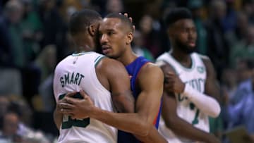 BOSTON - NOVEMBER 27: Detroit Pistons' Avery Bradley and his former teammate Marcus Smart of the Boston Celtics embrace following the Pistons' victory. The Boston Celtics host the Detroit Pistons in a regular season NBA basketball game at TD Garden in Boston on Nov. 27, 2017. (Photo by Jim Davis/The Boston Globe via Getty Images)