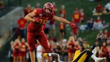 AMES, IA - SEPTEMBER 14: Tight end Charlie Kolar #88 of the Iowa State Cyclones jumps up and over defensive back Geno Stone #9 of the Iowa Hawkeyes as he rushed for yards in the first half of play at Jack Trice Stadium on September 14, 2019 in Ames, Iowa. (Photo by David Purdy/Getty Images)