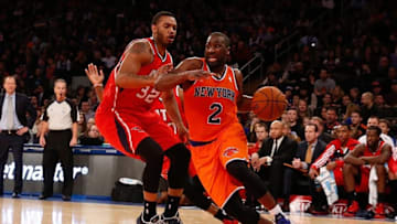Nov 16, 2013; New York, NY, USA; New York Knicks point guard Raymond Felton (2) drives past Atlanta Hawks power forward Mike Scott (32) during the third quarter at Madison Square Garden. Atlanta Hawks won 110-90. Mandatory Credit: Anthony Gruppuso-USA TODAY Sports